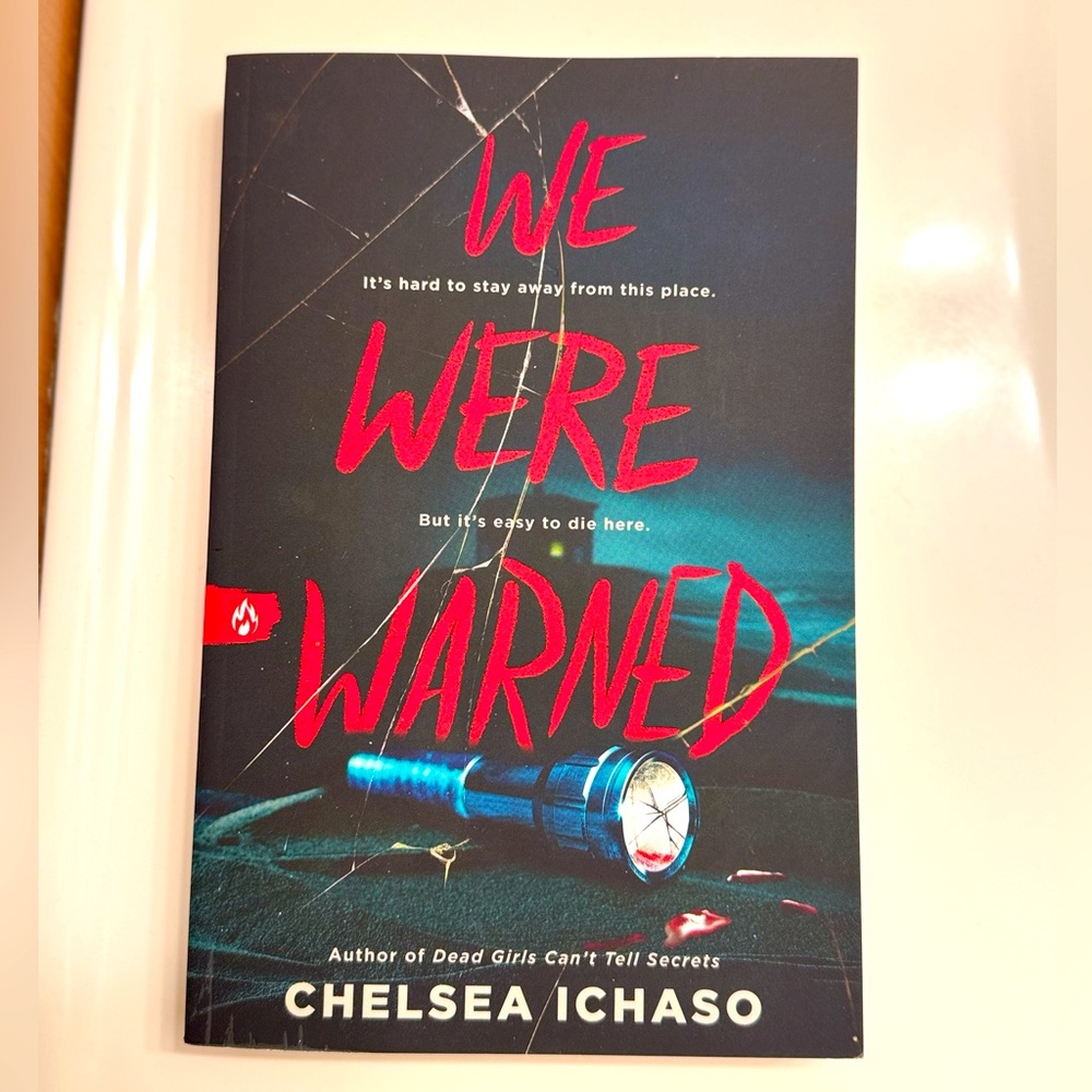 We Were Warned Book by Chelsea Ichaso